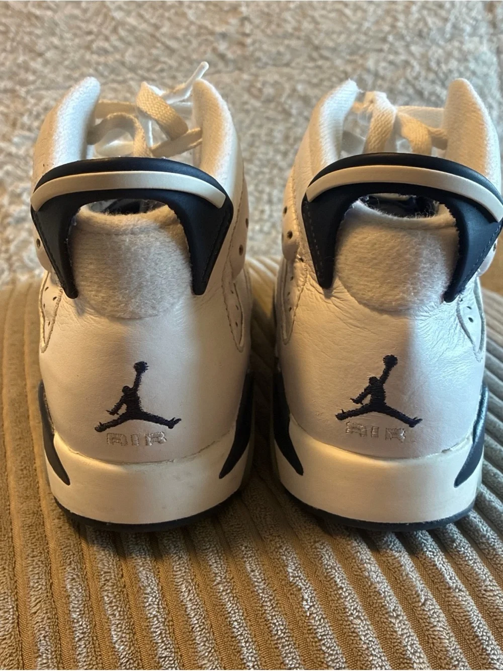 Jordan White and Navy High-Top Basketball Sneakers